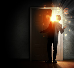 Wall Mural - Young businessman opening door