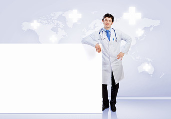 Wall Mural - Male doctor with banner