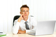 © Africa Studio - Portrait of young businessman in office