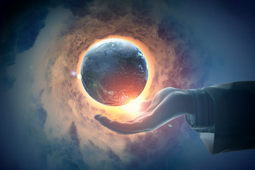 Wall Mural - image of earth planet on hand