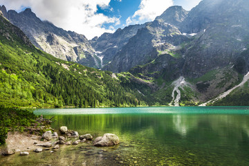 Wall Mural - crystal clear mountain lake and rocky mountains