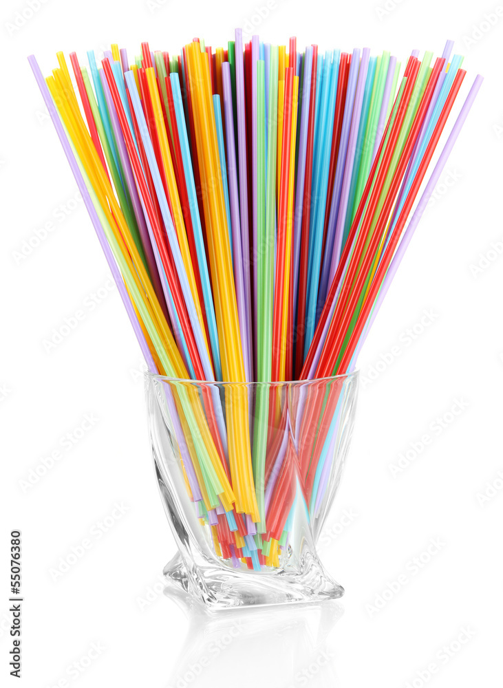 Many straws in glass isolated on white