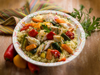 Canvas Print - couscous with fish and vegetables, selective focus