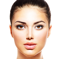Wall Mural - beautiful young woman with clean fresh skin isolated on white