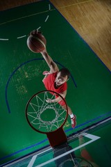 Wall Mural - basketball player in action