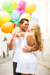 Wall Mural - couple with colorful balloons