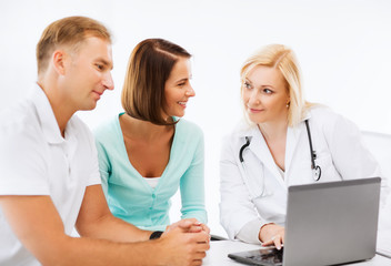 Sticker - doctor with patients looking at laptop