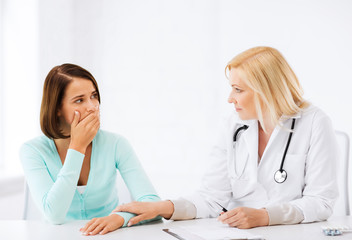 Wall Mural - doctor with patient in hospital