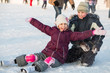© Pavel Losevsky - Brother and sister fell while skating and playing with snow