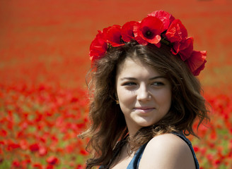 Wall Mural - Young Woman  in Poppy Field