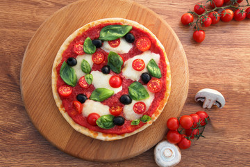 Wall Mural - Delicious Crisp Italian pizza with Italian tricolor