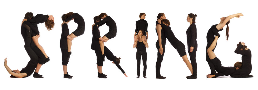 people standing over white forming SPRING word