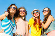 © adam121 - group of young people wearing sunglasses and hat