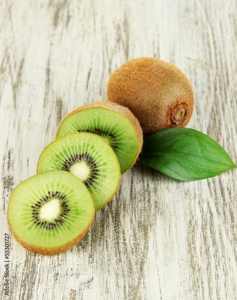 Ripe kiwi on wooden table close-up