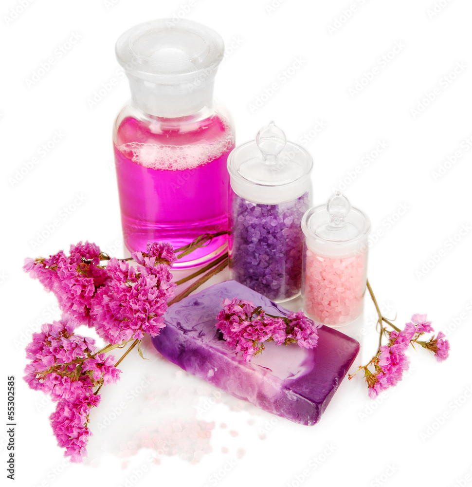 Hand made soap with sea salts and liquid soap isolated on white