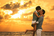 © Patrick Foto - Young asian couple in love staying and kissing on the beach