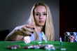 © grufnar - woman throwing poker chips on the table