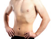 © Africa Studio - Fit male torso with hands on hips, muscular body and healthy lifestyle, isolated on white background
