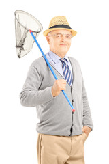 Poster - Smiling mature gentleman posing with a butterfly net