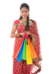 Wall Mural - Indian woman holding shopping bags