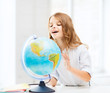 © Syda Productions - student girl with globe at school