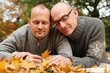 Loving gay couple with closed eyes Autumn Portrait