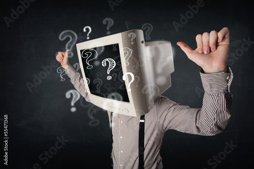 Fototapeta do kuchni Businessman with a computer monitor head and question marks