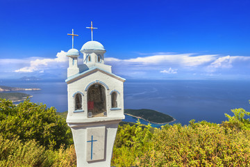 Small church icon in Greece Ithaki island with sea background an