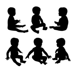 Wall Mural - little babies sitting silhouettes set 2