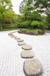 © torsakarin - Zen stone path in a Japanese Garden
