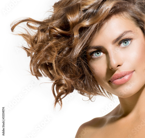 Fototapeta dla dzieci Beauty Young Woman Portrait over White. Short Curly Hair