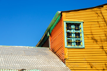 Fototapete - Orange Building and Blue Sky
