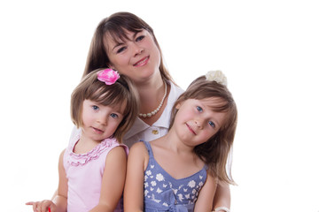 Happy mother with two little daughters