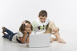 © mikhaluk - Kids on laptop