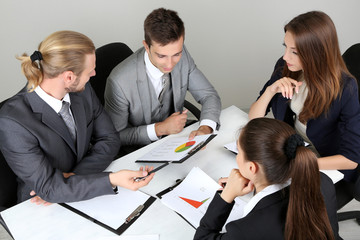 Wall Mural - Group of business people having meeting together