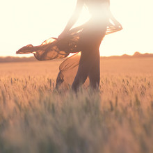Silhouette Of Woman Body In The Field