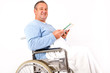 © Edler von Rabenstein - Man in wheelchair with book