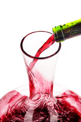 Sticker - Red wine being poured in a decanter