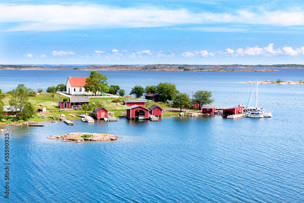 Small village with red buildings in Finnish archipelago - obrazy, fototapety, plakaty 