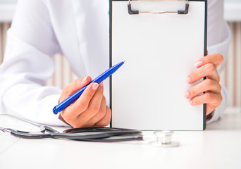 doctor's hands with a plane-table