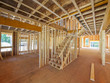 © Christian Delbert - Interior framing of a new house under construction
