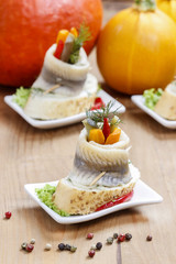 Wall Mural - Pickled herring rolls with vegetables