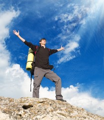 Canvas Print - Man on top of mountain.