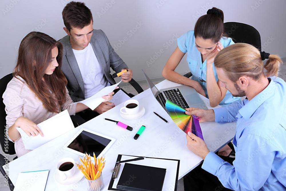 Business team working on their project together at office