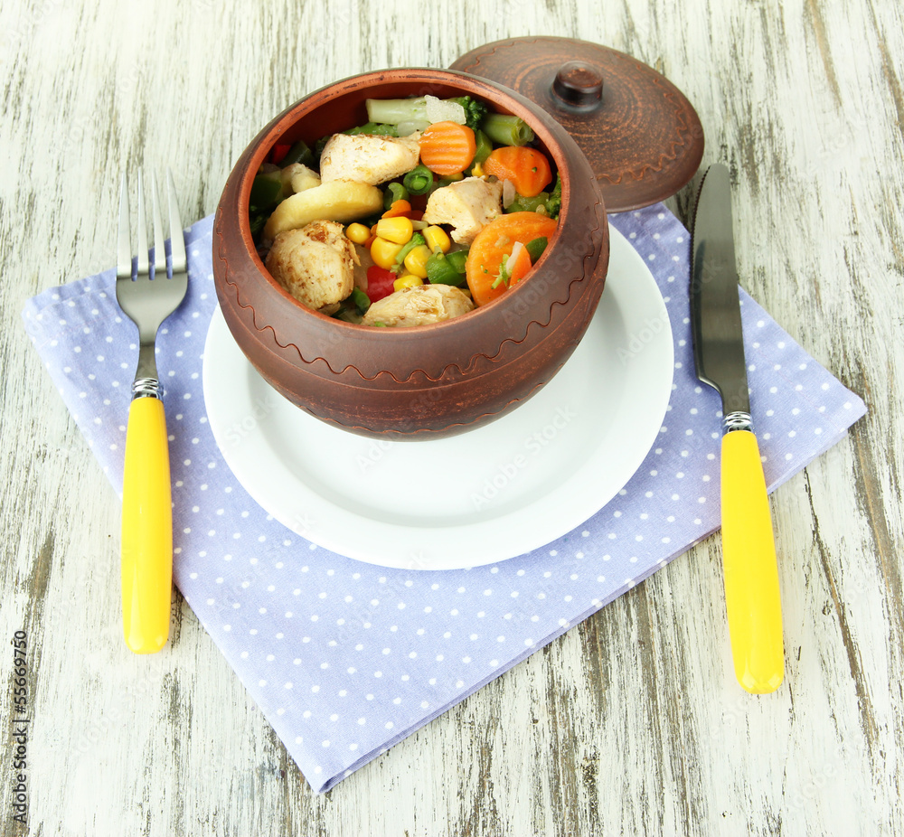 Baked mixed vegetable with chicken breast in pot,