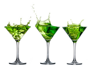 Wall Mural - Green alcohol cocktail set with splash on white