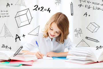 Canvas Print - student girl studying at school