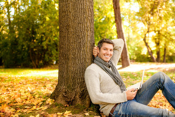 Wall Mural - relaxing male working outdoor