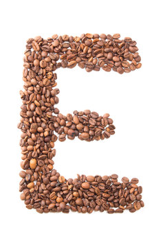 Letter E, alphabet from coffee beans on white background