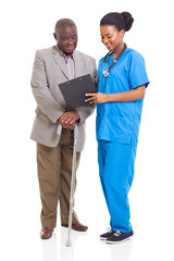 Wall Mural - young african healthcare worker and senior patient